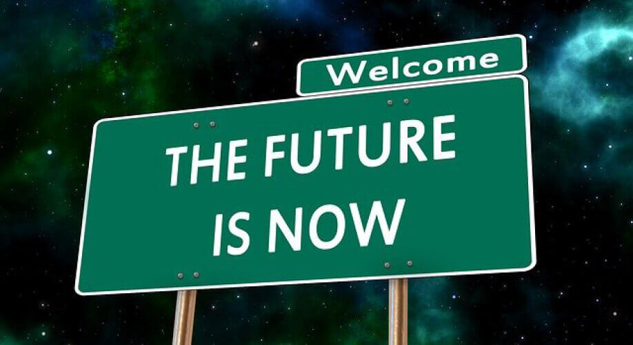 Blog | BPO ist das Modell der Gegenwart | Gruenes Schild mit weißer Schrift | Welcome THE FUTURE IS NOW
