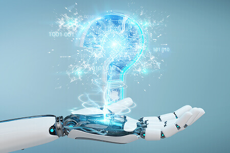 Künstliche Intelligenz: Roboterhand mit Fragezeichen | Blog