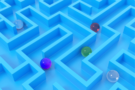 Blog| blaues Labyrinth mit bunten Murmeln als Methapher für digitale Worklfows